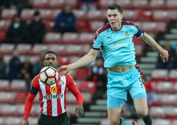 Burnley's Michael Keane gets to a ball ahead of Sunderland's Jermain Defoe

Photographer Alex Dodd/CameraSport

Emirates FA Cup Third Round - Sunderland v Burnley - Saturday 7th January 2017 - Sunderland Stadium of Light - Sunderland
 
World Copyright Â© 2017 CameraSport. All rights reserved. 43 Linden Ave. Countesthorpe. Leicester. England. LE8 5PG - Tel: +44 (0) 116 277 4147 - admin@camerasport.com - www.camerasport.com