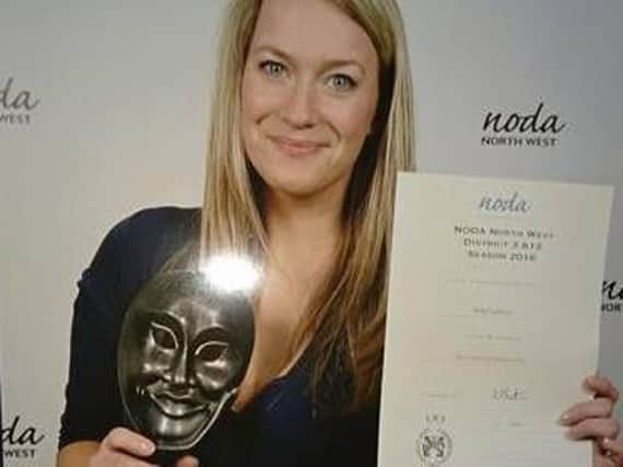 Holly Fairburn with her NODA Award. (s)