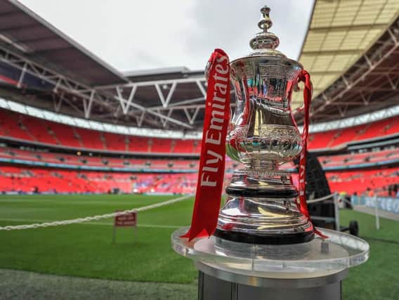 The FA Cup on display at Wembley Stadium