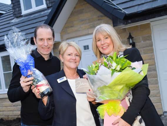 Adam and Jackie Spurgeon with Jones Homes' Denise (centre).