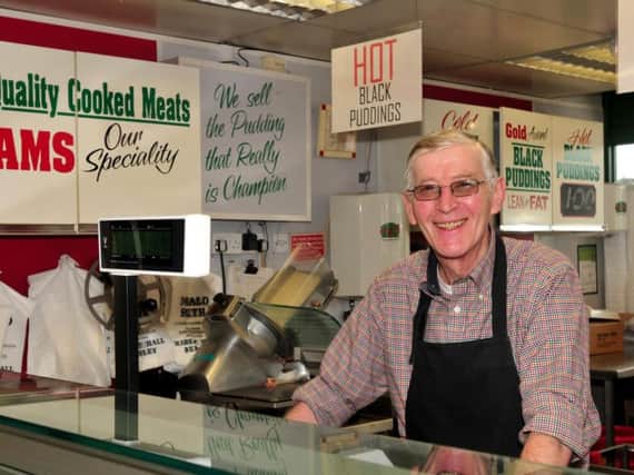 Burnley Market Hall trader Donald Smith has vowed to continue with his long established delicatessen business despite a break-in.