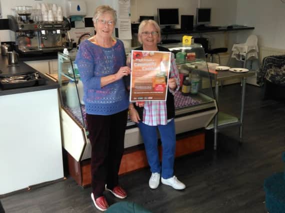 Volunteers Jackie Shaw and Jean Duff are pictured with the promotional poster. (s)