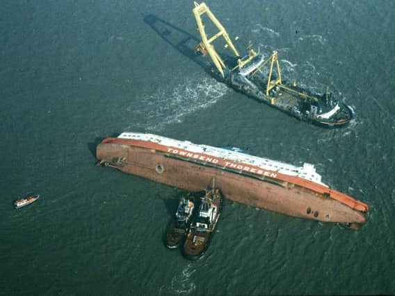 File photo dated 07/03/87 of rescue vessels surrounding the stricken Townsend Thorensen car ferry Herald of Free Enterprise, which capsized near the entrance to Zeebrugge Harbour, Belgium, on its way to Dover.