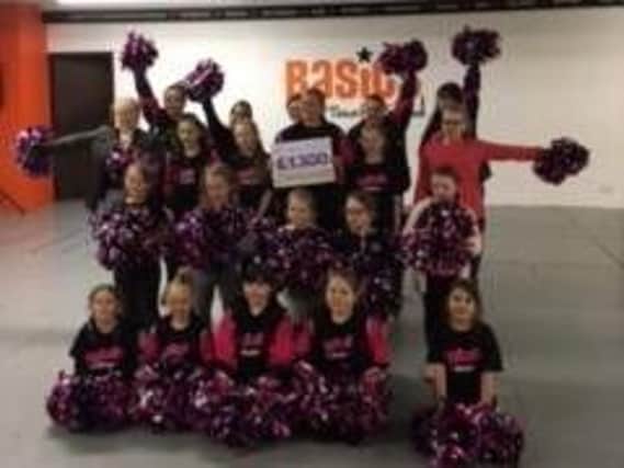 Dance teacher Lianne Hill and her students who have raised 1,300 for Pendleside Hospice.