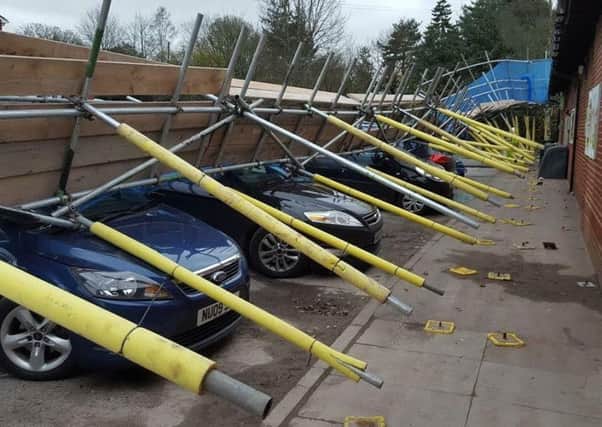 The scaffolding crushed six cars