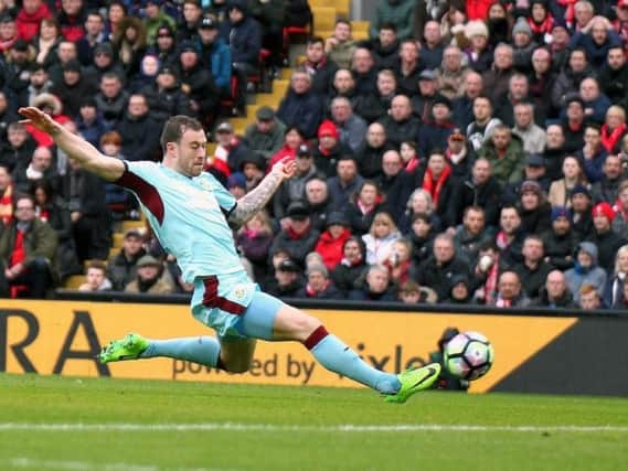 Ashley Barnes scores the opener at Liverpool