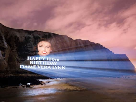 A Dame Vera Lynn portrait projected onto the White Cliffs of Dover