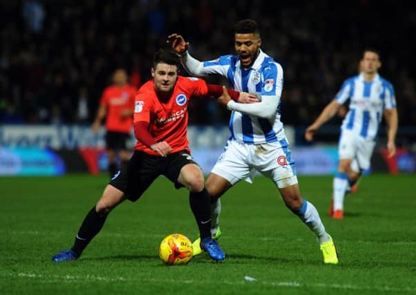 Huddersfield Town v Brighton & Hove Albion.
Huddersfield's Elias Kachunga battles with Brighton's Oliver Norwood.
2nd February 2017.
Picture : Jonathan Gawthorpe