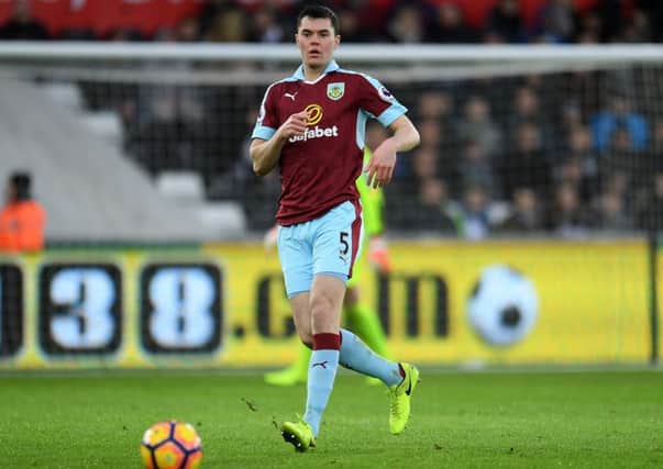 Burnley's Michael Keane in action during todays match  

Photographer Ashley Crowden/CameraSport

The Premier League - Swansea City v Burnley - Saturday 4th March 2017 - Liberty Stadium - Swansea

World Copyright Â© 2017 CameraSport. All rights reserved. 43 Linden Ave. Countesthorpe. Leicester. England. LE8 5PG - Tel: +44 (0) 116 277 4147 - admin@camerasport.com - www.camerasport.com