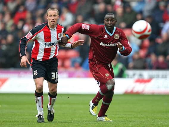 Andy Cole in action for the Clarets