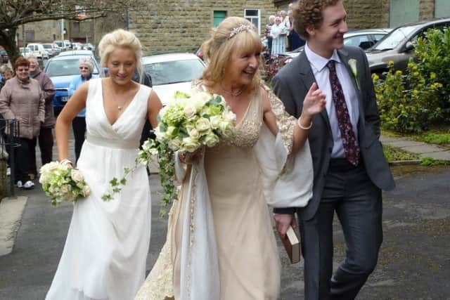 Chloe Giltrow-Shaw with her brother Laurence and their mum, Paula on her wedding day. (s)