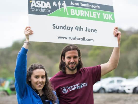 Danni Carr from Run For All and George Boyd at the launch of the Burnley 10k at Barnfield Training Centre