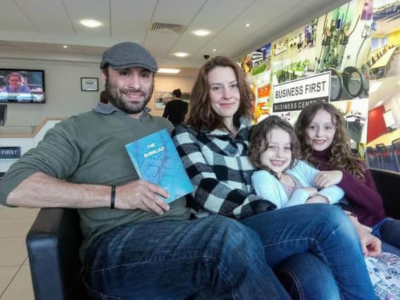 Damo Beeson-Bullen with partner Emily Oakman and children Ivy and Roxy