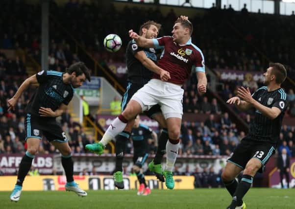 West Bromwich Albion's Craig Dawson prevents Burnley's Sam Vokes getting a clear chance on goal