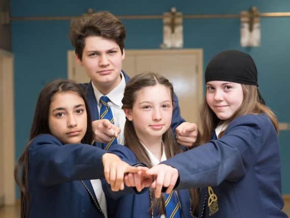 The debating team from Burnley's Blessed Trinity RC College who are Millie Towers, Gregory Worden, Shakira Khan and Emma Taylor.