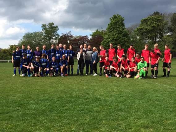 The teams and relatives at the charity football tournament to honour Oliver McIvor who died in January at the age of 17.