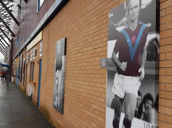 Peter Noble's image on the Jimmy McIlroy stand at Turf Moor