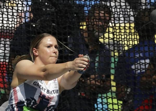 Britain's Sophie Hitchon competes in the women's hammer throw final during the athletics competitions in the Olympic stadium of the 2016 Summer Olympics in Rio de Janeiro, Brazil, Monday, Aug. 15, 2016. (AP Photo/Matt Dunham)