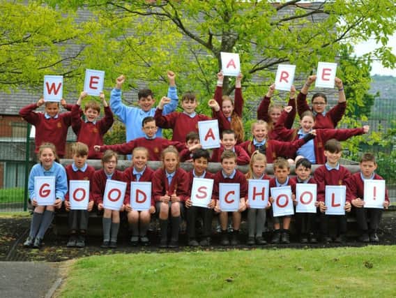 Pupils at Holy Trinity C of E Primary School in Burnley are full of smiles after being rated as good by Ofsted.