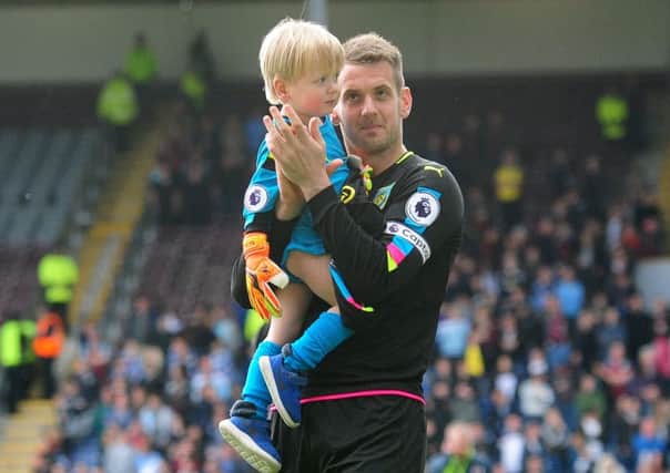 Burnley's Thomas Heaton applauds the fans at the end of the game, with his young child in arms

Photographer Andrew Vaughan/CameraSport

The Premier League - Burnley v West Ham United - Sunday 21st May 2017 - Turf Moor - Burnley

World Copyright Â© 2017 CameraSport. All rights reserved. 43 Linden Ave. Countesthorpe. Leicester. England. LE8 5PG - Tel: +44 (0) 116 277 4147 - admin@camerasport.com - www.camerasport.com