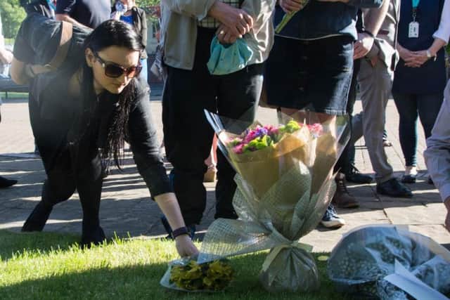 Flowers were laid at the Peace Gardens