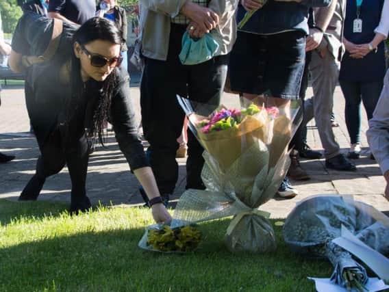 Flowers were laid at the Peace Gardens