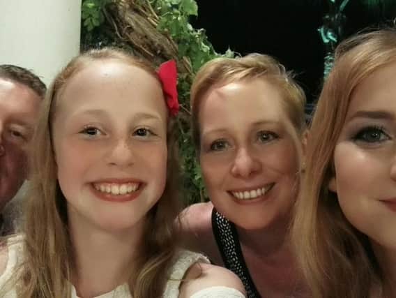 Kim Birtwistle, who was caught up in the Manchester bomb blast with her youngest daughter Amie (centre) with her husband Pete and the couple's older daughter Chloe.