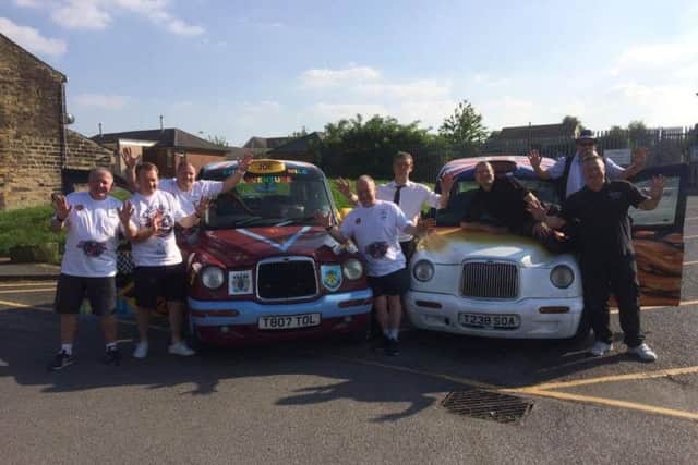 The Lancashire Lads are all ready for the off in the Benidorm or Bust rally in their customised London taxis.