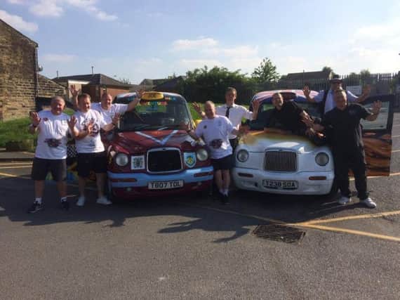 The Lancashire Lads are all ready for the off in the Benidorm or Bust rally in their customised London taxis.