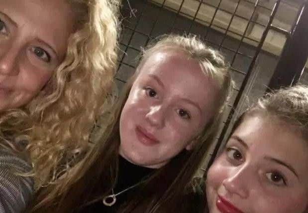 Bella Whittaker (centre) and her friend Leah Dand with Leah's mum Rachel who fear they have missed out on tickets for the I Love Manchester benefit concert on Sunday.