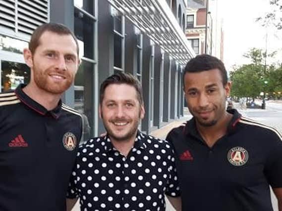 Former Burnley players Chris McCann (left) andTyrone Mears (right) with Freewebstore's Partner Manager, Stephen Darwood.