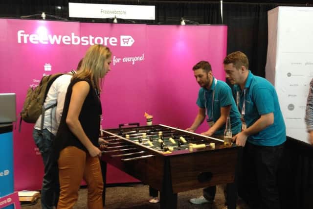 The Freewebstore team in action at the expo.