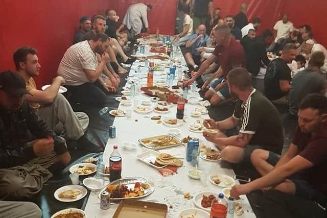 Guests gather for the Ramadan feast at the Muscle Factory in Burnley.