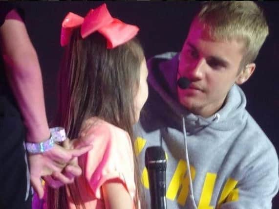 Destiny Mannan (eight), with Justin Bieber at his Cardiff gig last Friday, June 30th.
