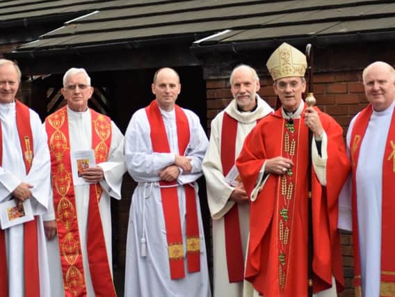 Leading the final mass at St Philip's Church in Padiham are (from left to right) Rev JohnDaly, Rev Francis Jennings, Rev Paul Blackburn, Rev Alan Swift, Rt Rev John Arnold and Rev Peter Hopkinson