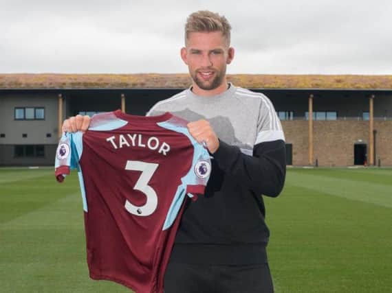 Charlie Taylor will fight for Stephen Ward for a left back spot