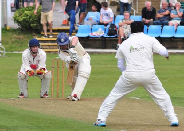 David Brown (pictured batting) top scored for Burnley in defeat against Ramsbottom