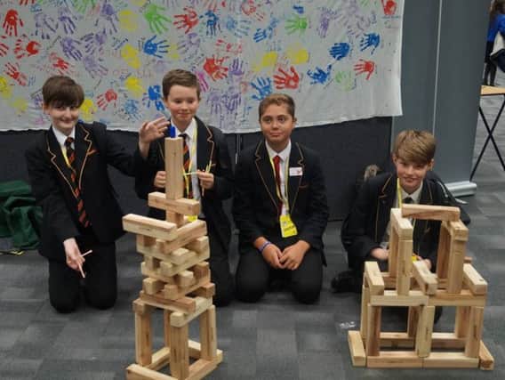 Year 8 and 7 Shuttleworth College pupils enjoying the floor show exhibition at Lancashire Science Festival. (s)