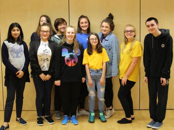 Workshop Leader Amber Tither (third from right) with members of Burnley Youth Theatres Pieces of Me. (s)