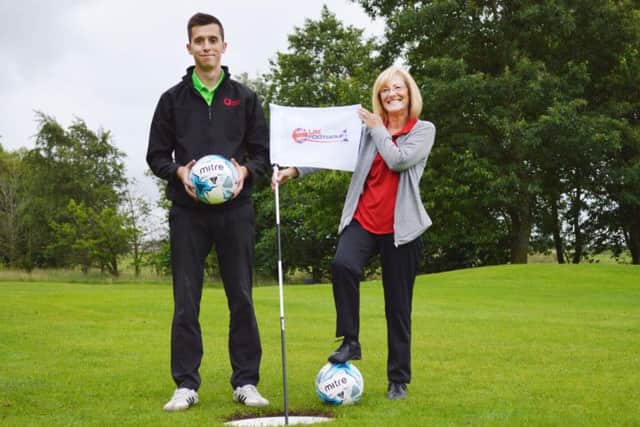 Wesley Kellow, assistant manager at Burnley Leisure, with Debbie Barber from England Golf.
