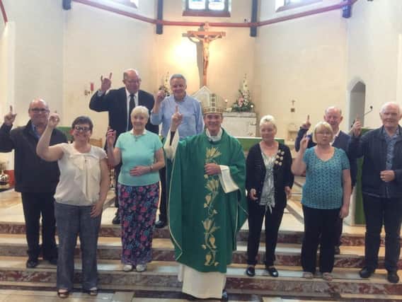 Members of the Catholic Deaf Association at St. John the Baptist Church in Burnley.