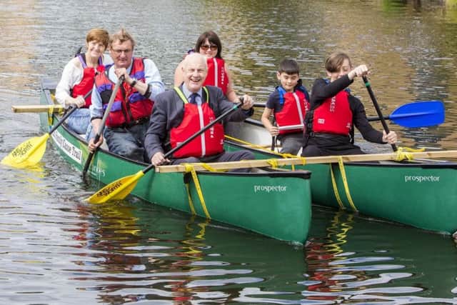 Mayor of Burnley Howard Baker joins residents in the canoes