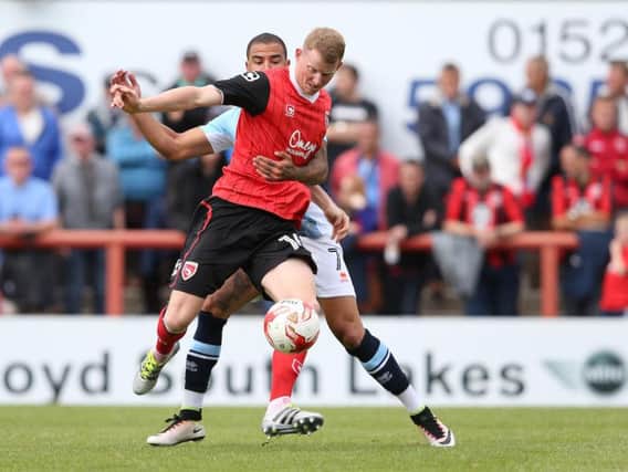 Alex Whitmore spent time on loan with Morecambe last season