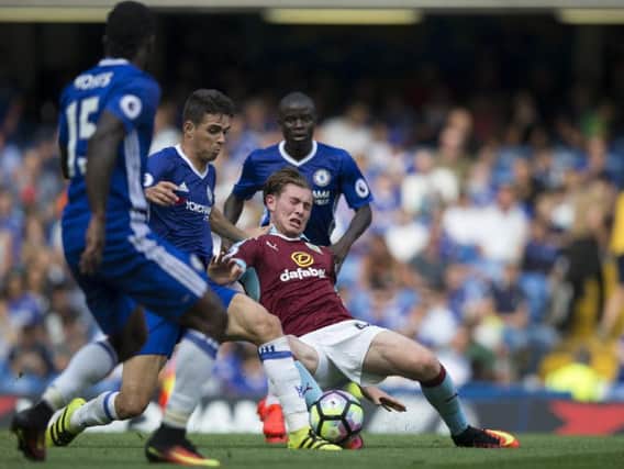 Aiden O'Neill is challenged by Chelsea's Oscar at Stamford Bridge last August