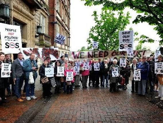 Dozens of Sabden residents demonstrate outside County Hall, Preston, in May 2016 after their one and only bus service was axed.