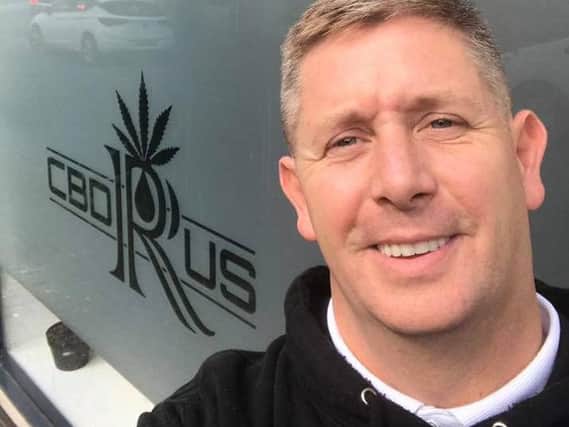 Scott Hardacre outside his new shop CBD R Us, believed to be the first in the UK to sell a food supplement derived from cannabis