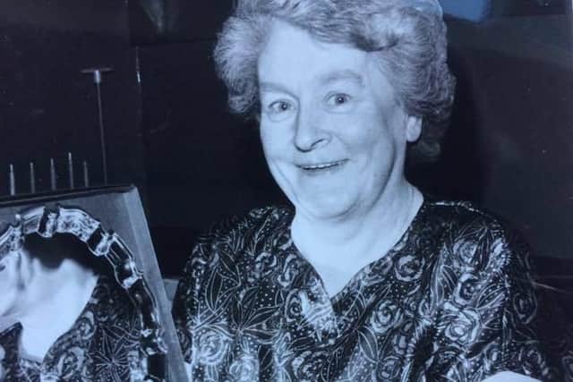 Former Woodtop Inn Iandlady Margaret Marsden, who has died at the age of 89, with a silver plate she received after serving for 20 years behind the bar.