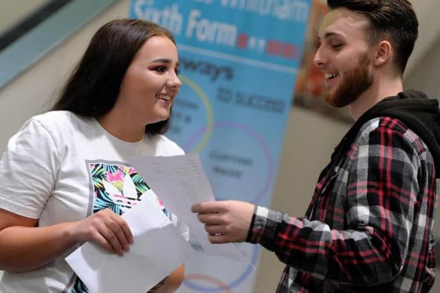 All smiles for A'level students Bethany Drinkwater and Connor Mulcahy at Thomas Whitham Sixth Form, Burnley.
