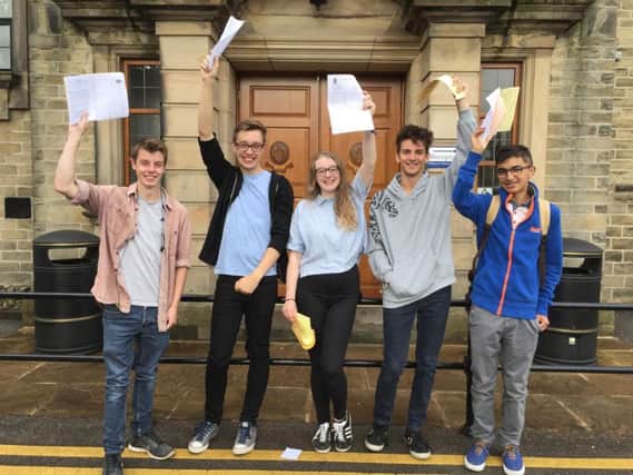 Oliver Shackleton, Josh Davy, Seren Munro, Fred Duck and Abdullah Iqbal celebrating their A Level exam results.