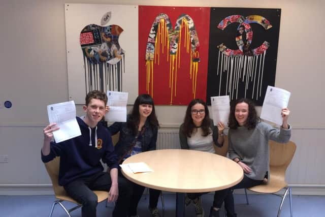 Twins James and Caitlin Webb with twins Milly and Eleanor McEvoy celebrating their A Level results.